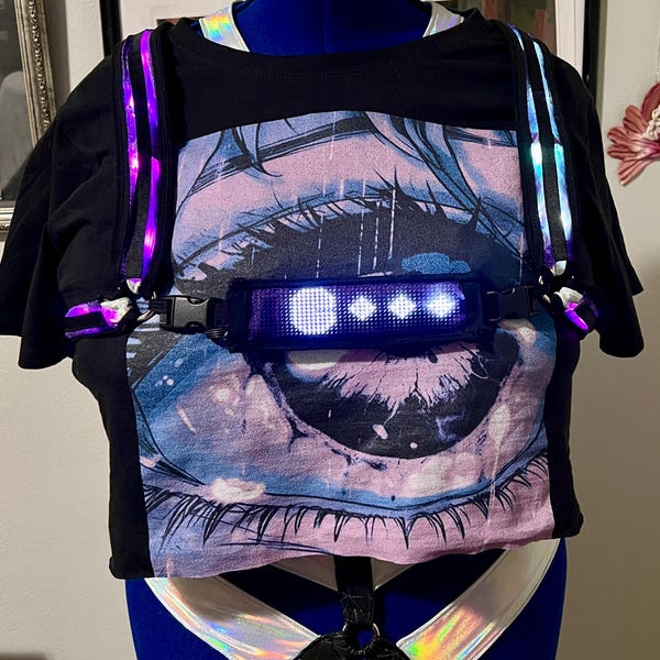 Cyberpunk harness with LED matrix panels — futuristic wearable tech fashion project