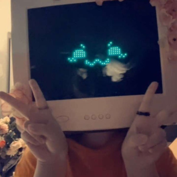 TV head costume with LED matrix panel by artichao — glowing screen face cosplay