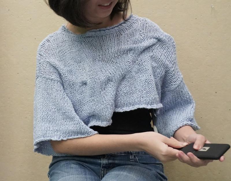 LED wearable tech sweater glowing with colorful lights
