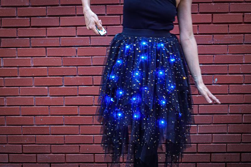 Light up LED skirt glowing with colorful lights