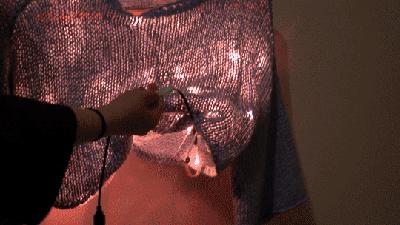 LED sweater cycling through color modes for wearable tech demonstration