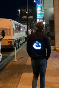 LED Matrix Hoodie showing light effects on a dark garment